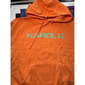 Karol G unisex-adult Karol G Official Tropicoqueta Merch Hoodie Orange XL